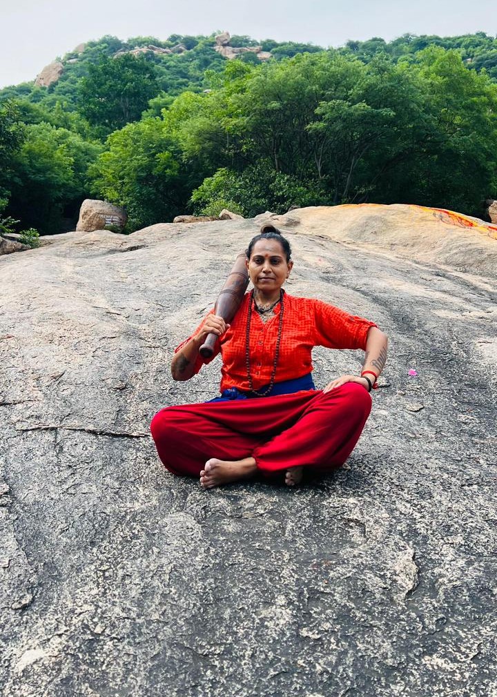 Rathi Priya in meditation on the rocks